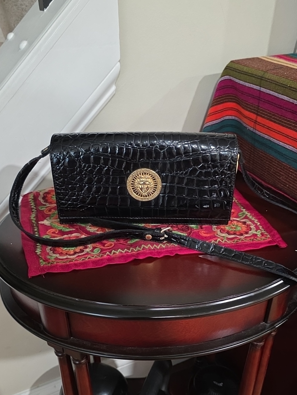 Black Croc-Embossed Crossbody Bag with Gold Medallion Accent
